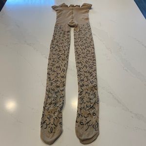 Vintage 2000's CHANEL CC Tights
Size: Large  ⭐️ collectors item!!